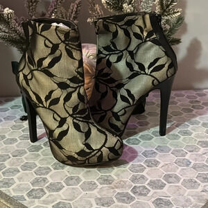"Vintage Forever 21 Taupe and Black Lace-Covered Booties: Timeless and Elegant.